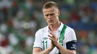 Republic of Ireland's skipper for the night Damien Duff leaves the Poznan pitch.