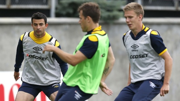 Sweden's players control the ball during training on the Koncha Zaspa Training Centre pitch near Kiev.