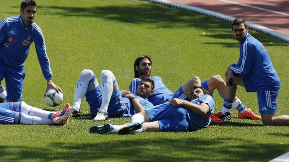 Greece players take a break during training in Legionowo about 15 miles north of Warsaw.