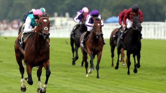 Frankel ridden by Tom Queally wins the Queen Anne Stakes.
