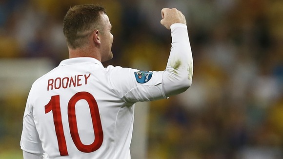 Wayne Rooney celebrates his easy header that saw England through to last eight.
