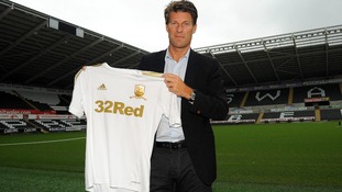 Michael Laudrup with Swansea shirt