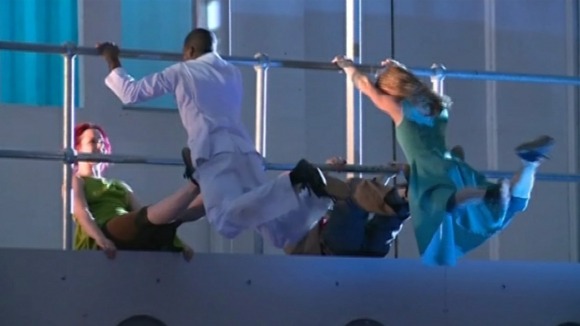 Aerial acrobats perform mid air during the performance