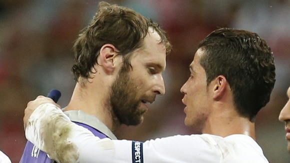 Cristiano Ronaldo chats with Czech keeper Petr Cech after the quarter-final.