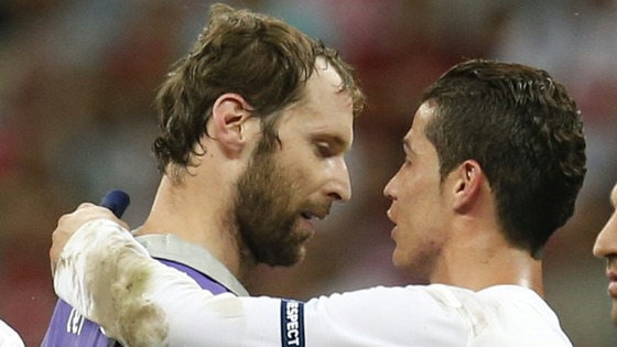 Cristiano Ronaldo chats with Czech keeper Petr Cech after the quarter-final.