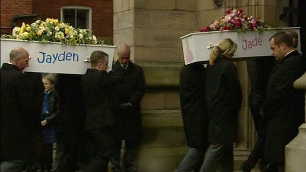 Jayden and Jade Philpott's coffins are carried into church.