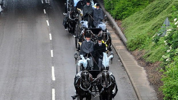 The hearses carrying the bodies of the five boys killed in the Derby house fire.