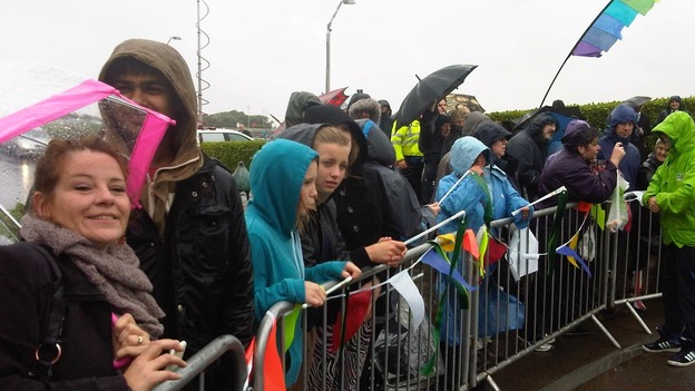 Crowds braving the rain in Morecambe as they wait for the relay