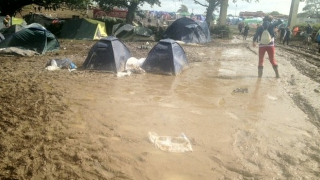 Campers battle through the mud