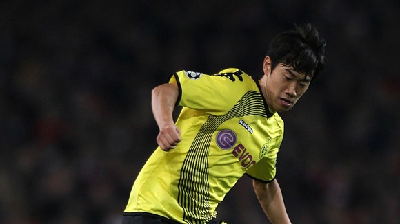 Shinji Kagawa in action for German double winners Borussia Dortmund