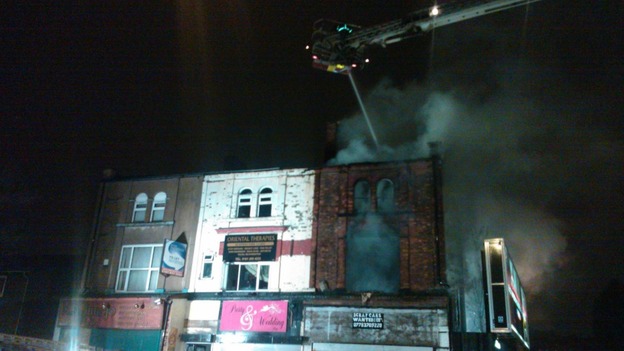 Aerial hose douses fire