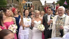 Catherine and Darren - picture with the torch is icing on the cake