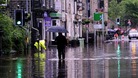Floodwaters surround local shops in the centre of Hebden Bridge in West Yorkshire.