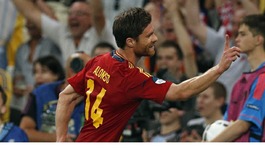 Spain midfielder Xabi Alonso celebrates his first goal.