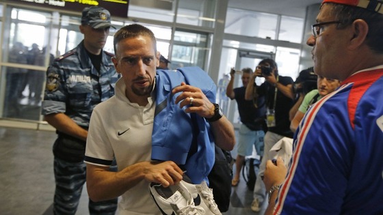 France midfielder Franck Ribery enters Donetsk Airport.