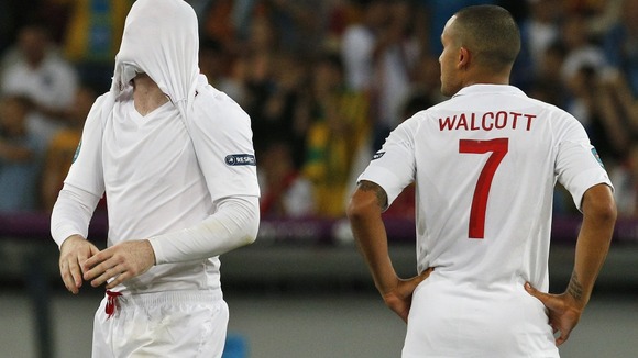 Wayne Rooney is disappointed after losing on penalties.