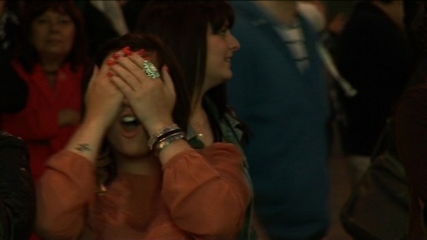Fan watches football