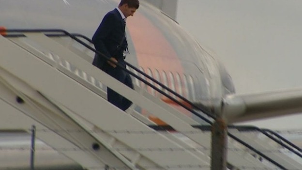 Stephen Gerrard steps off a plane