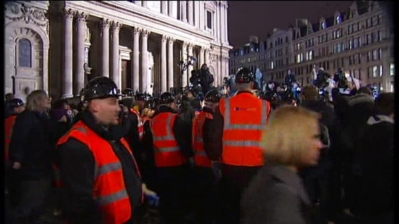 Police evicting people from the Occupy St Pauls camp in London