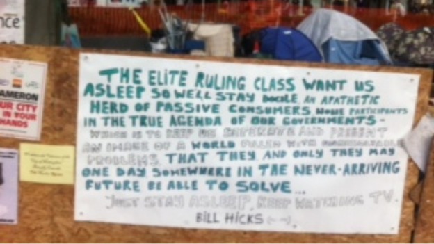 Posters on the boundary of the campsite
