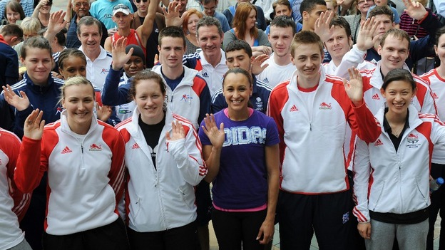 Jessica Ennis (centre) with fellow Olympic athletes in Sheffield city centre ahead of the London 2012 Olympic Games