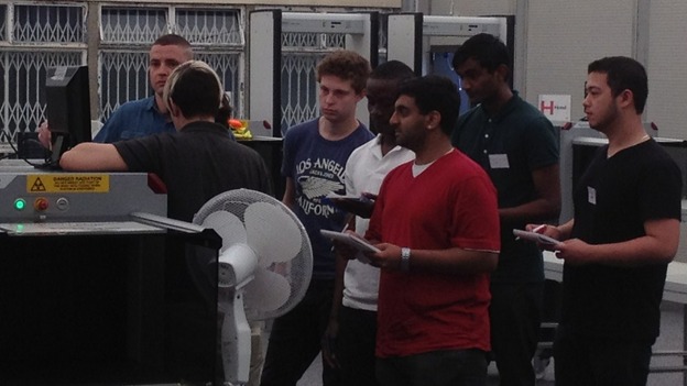 New recruits learn how to operate scanners