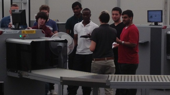 New recruits learn how to operate security scanners