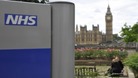 NHS with House of Commons in the background