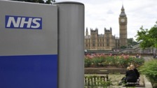 NHS with House of Commons in the background