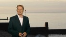 Simon Parkin in front of weather photo