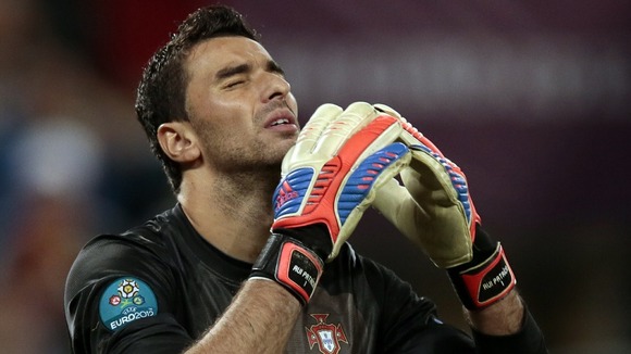 Portugal goalkeeper Rui Patricio looks dejected after losing on penalties.