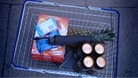 A basket of shopping items. 