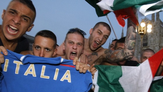 Italian supporters celebrate their team's victory 