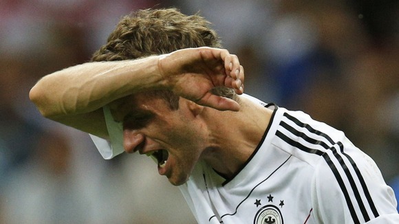 Germany's Thomas Muller reacts during the semi-final in Warsaw.