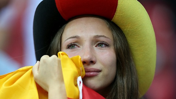 A German fan looks dejected in the stands after the game.