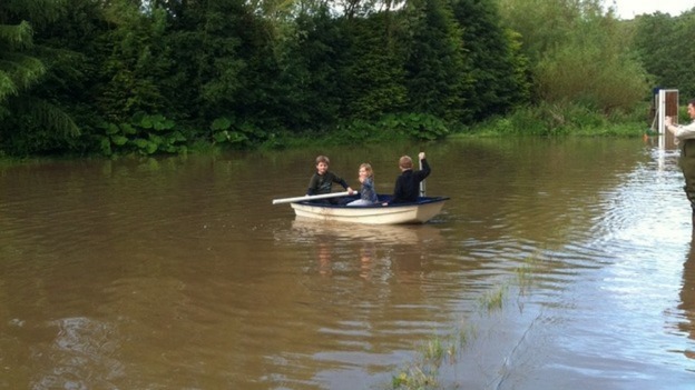 Rowing across the garden.