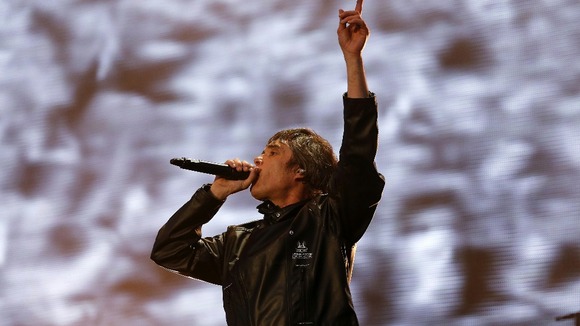 Ian Brown performs on stage on the opening night of their three night series of reunion concerts.