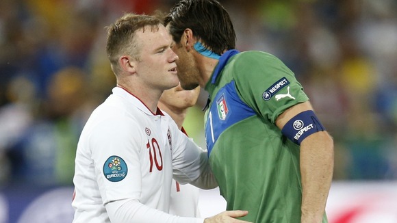 IItaly goalkeeper Gianluigi Buffon with Wayne Rooney.