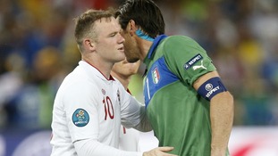 IItaly goalkeeper Gianluigi Buffon with Wayne Rooney.