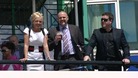 Racegoers enjoy the sunshine in the build up to the race.