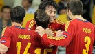 Spain's David Silva (centre) celebrates scoring their first goal of the game with team-mates.