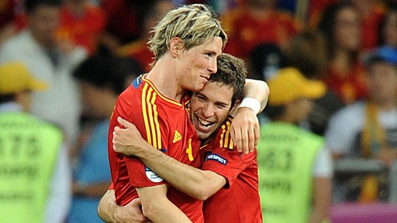 Spain's Fernando Torres (left) celebrates scoring their third goal of the game with fellow goalscorer Ramos Jordi Alba.