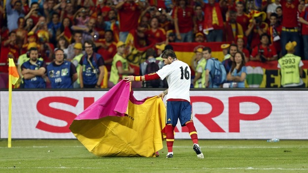 Spain defender Sergio Ramos pretends to be a matador.