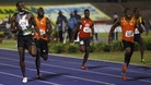 Usain Bolt and Yohan Blake compete in the men's 200 meters final at the Jamaican Olympic trials in Kingston