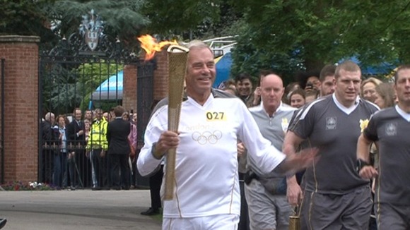 Keith Richards carrying the flame into Rugby School this morning