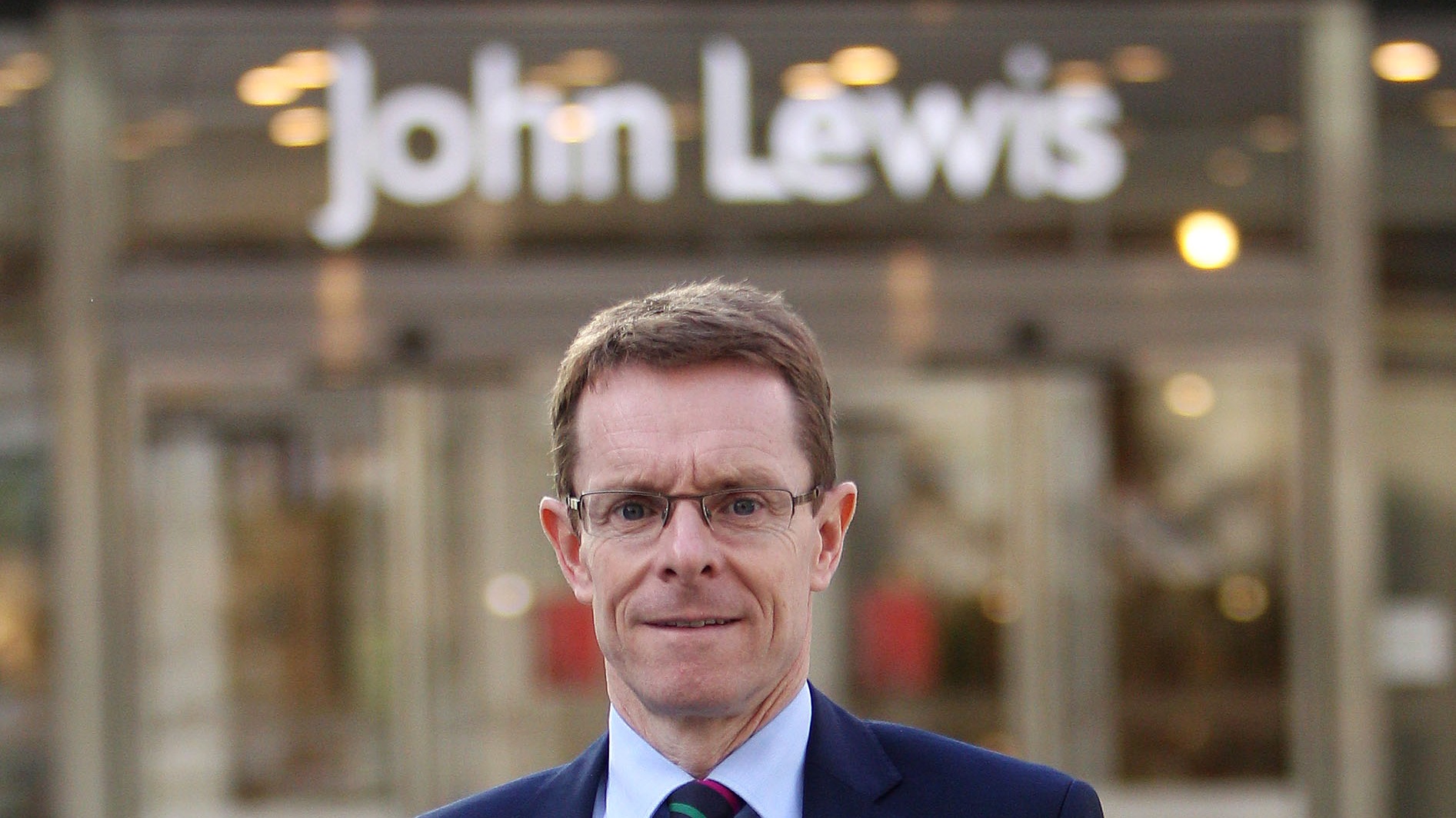 Why does John Lewis's boss have mixed feelings about Black Friday when