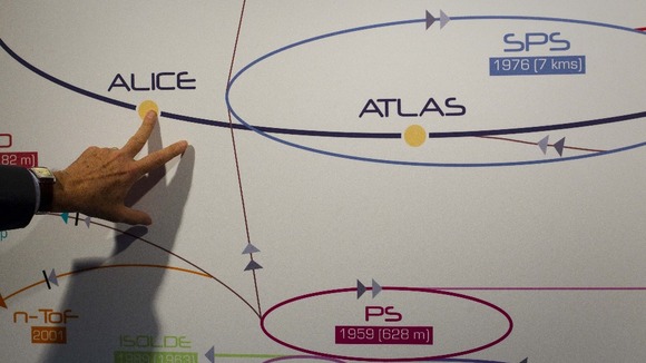Physicist explaining the ATLAS experiment