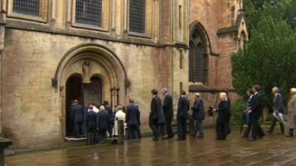 Mourners going into church