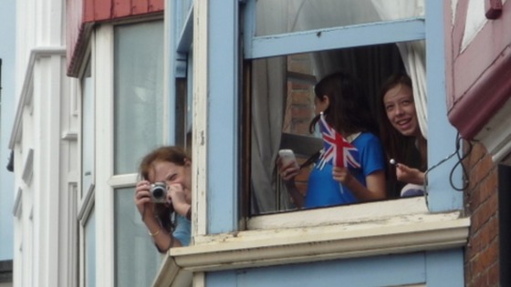 People getting ready to take pictures of the Olympic Torch in Cromer