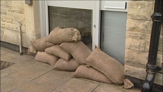 Sandbags block doorways